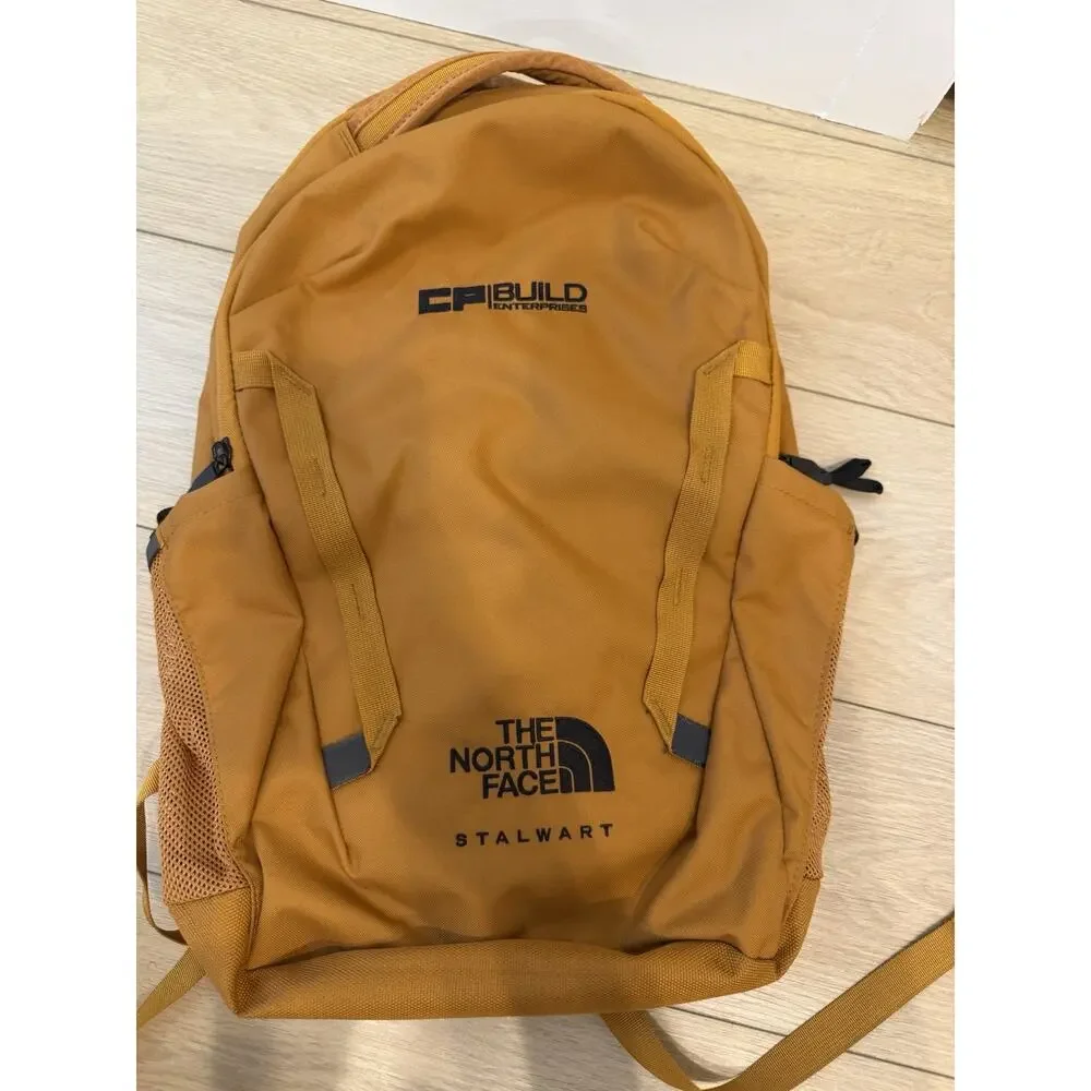 The North Face Stalwart Backpack in timber tan, customized w/a Logo.